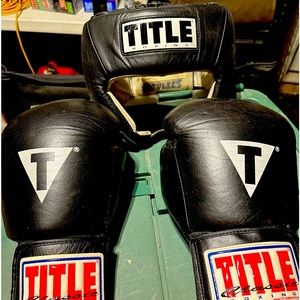 16 oz title boxing gloves and 10oz regulation headgear